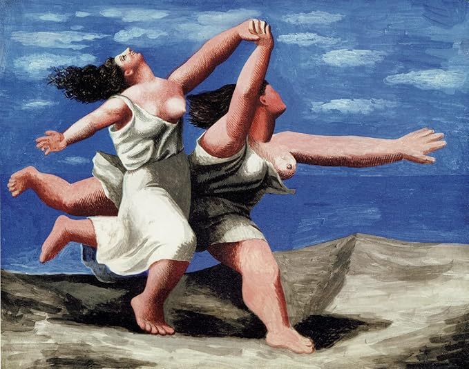Two women running on the beach