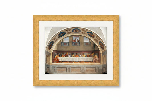 A framed art print of Leonardo da Vinci's Last Supper, featuring the painting within an arched architectural scene, presented with a cream white mat and a textured gold frame.