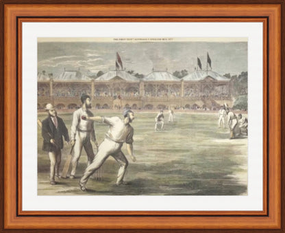 A framed print featuring a historical image of a cricket match between Australia and England at the MCG, with players in action on the field.